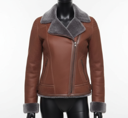 Brown leather jacket with gray fur collar and cuffs on a mannequin against a white background